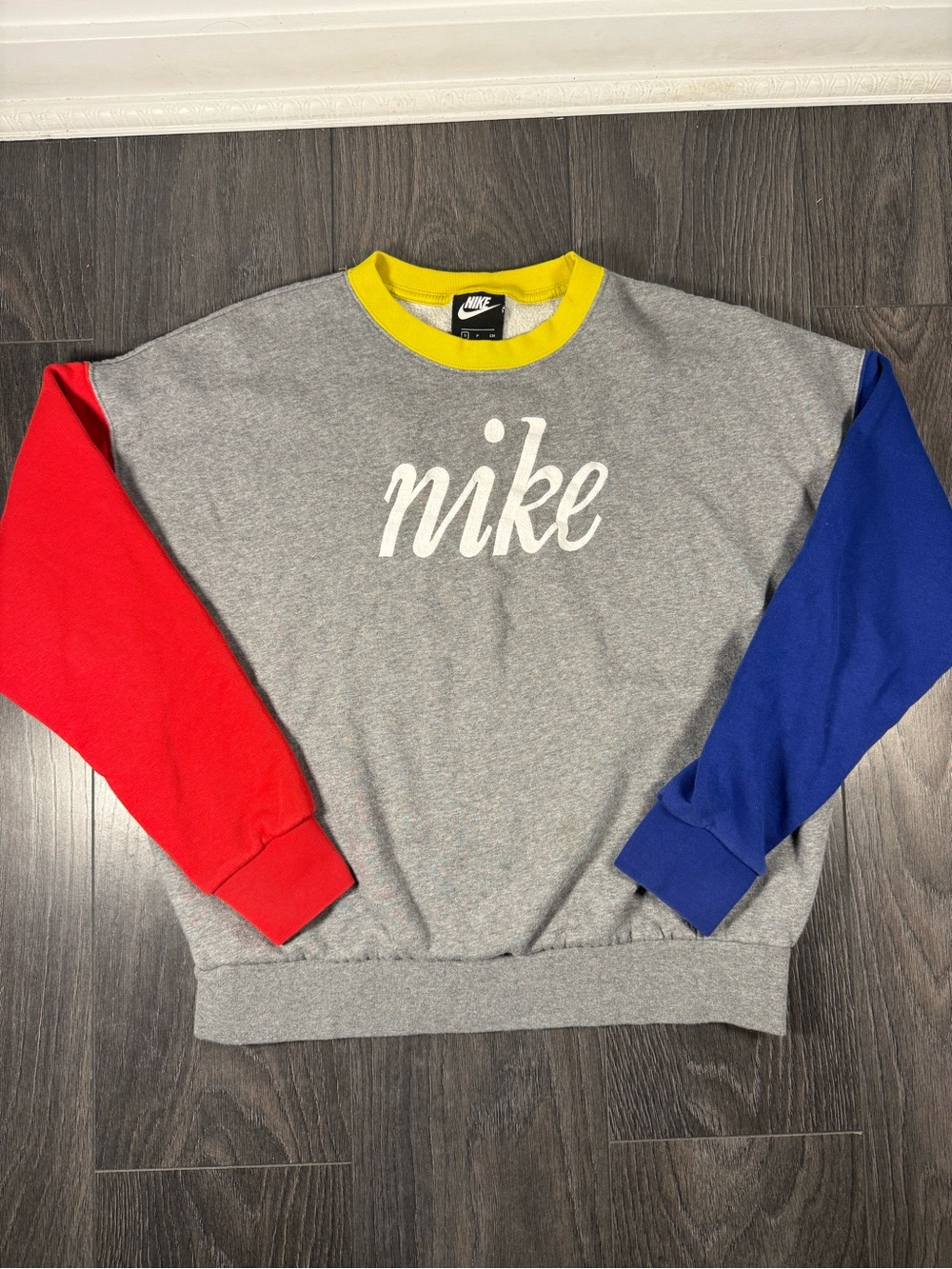 Nike Women’s Gray Crewneck Sweater with Red & Blue Sleeve Panels and Yellow Neck